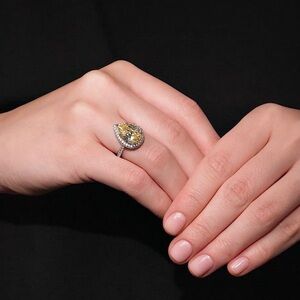 Silver ring with yellow CZ